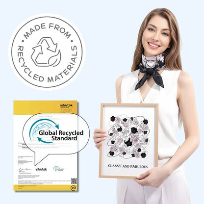 Woman holding a framed artwork with recycled material certification logos on a light blue background.
Sustainable Fashion Scarf
Designed for style, made with care. 
•        Eco-friendly elegance
•        GRS Certified
•        Recycled materials
•        Sustainable by Design
•        ESG values at heart
