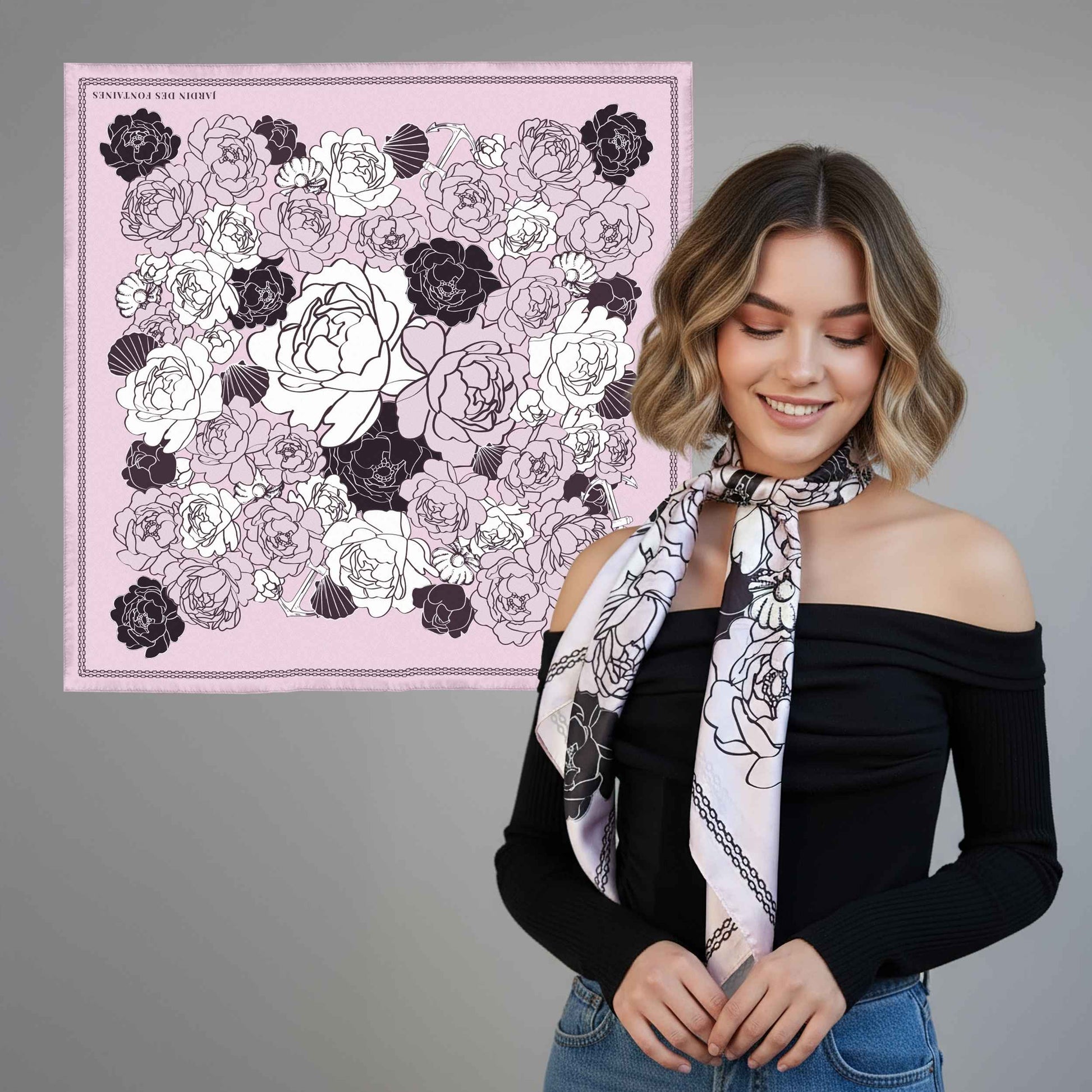 Woman wearing a floral scarf with a matching pink fabric panel in the background